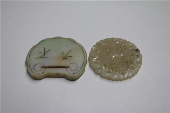A Chinese carved and pierced jade disc and one other (2)